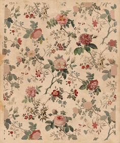 an old rug with flowers and leaves on it