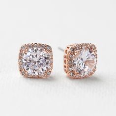 description These classic cushion round Cubic Zirconia studs are the perfect earrings for any occasion. end description materials Available in: 18K White Gold / Gold / Rose Gold over base metal Cubic Zirconia pave crystals Hypoallergenic post end materials details Diameter: 0.4in (1cm) end details sku #E313 end sku Ear Rings Studs, Wedding Earrings Studs, Bridal Earrings Studs, Bridal Statement Earrings, Crystal Wedding Jewelry, Bridesmaid Gifts Jewelry, Jewelry Crystal, Classy Jewelry, Earrings Wedding