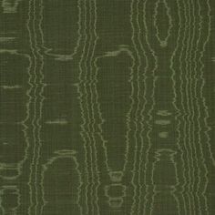 an upholstered green fabric with wavy lines