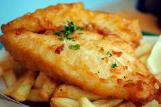 fried fish and french fries on a plate