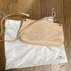 Never Used Lovely Color Light Blush Coach Bag. Shoulder Or Crossbody. Coach Shoulder Bag For On-the-go Spring Season, Coach Blush Bag For Everyday Use, Spring Coach Shoulder Bag With Removable Pouch, Coach Shoulder Bag With Removable Pouch For Spring, Blush Coach Bag For Everyday Use, Feminine Crossbody Bag With Removable Pouch, Blush Travel Pouch Bag, Feminine Coach Bags For Everyday Use, Spring Coach Bags With Detachable Strap