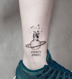 a woman's foot with a small tattoo on the ankle that reads, my future starshiper