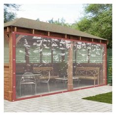 a wooden gazebo sitting on top of a brick patio