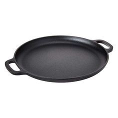 an empty cast iron skillet on a white background