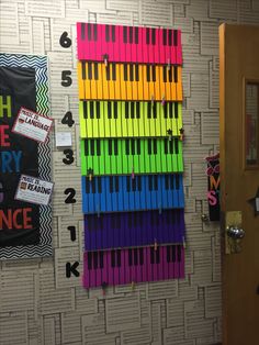 there are many different colored keys on the wall