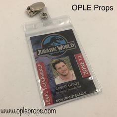 an id badge with a man's face and name on it, attached to a lanyard