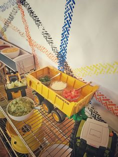 some food is sitting on top of a wire rack in front of a painted wall