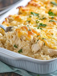 a casserole dish filled with chicken and rice