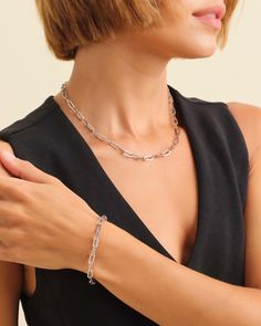 Discover timeless allure with our 5mm silver Paperclip Chain and Bracelet Set, meticulously crafted from 925 sterling silver and finished with precious rhodium. The elongated links of the paperclip chain exude modern minimalism, providing a subtle yet striking touch to your everyday style. Whether worn individually or layered, this set's versatility and refined craftsmanship make it a must-have addition to your jewelry collection. Silver Coat, How To Look Classy, Paper Clip, Bracelet Set, Chain Bracelet, Precious Metals, Silver Chain, Sterling Silver Jewelry, Everyday Fashion