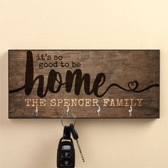 a wooden sign that says it's so good to be home the spencer family