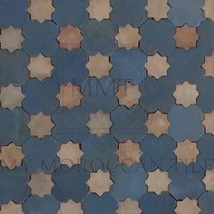 an old blue and brown tile pattern is shown