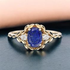 {WELCOME TO MY SHOP} THIS RING IS This ring is handmade by myself Jewelry Type - Handmade Metal - 925 Sterling Silver Gemstone -  Lapis Lazuli Gemstone Shape - Oval Gemstone Size - 8X6mm 1.5mm Gemstone Type Fected Gemstone Grade - AAA Gemstone Weight - 3carat Stamp - 925 Ring Weight - 2.5gm Plating - Yellow Gold Vermeil, Rose Gold Vermeil, Platinum Ring size can be choose from the selection box. "HANDMADE WITH LOVE" Matching band available: https://www.etsy.com/shop/NIZANART?ref=shop-header-name Sapphire Crystal Oval Ring For Gift, Handmade Oval Rose Gold Rings, Elegant Adjustable Blue Flower Ring, Elegant Blue Adjustable Flower Ring, Handmade Elegant Blue Birthstone Ring, Oval Blue Crystal Ring For Anniversary, Blue Oval Cabochon Ring For Gift, Royal Blue Oval Gemstone Rings, Oval Gemstone Rings In Royal Blue