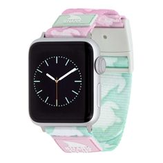 an apple watch with pink and green flowers on the band, is shown in front of a white background