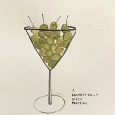 a drawing of a martini glass filled with olives