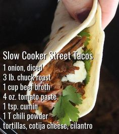 a person holding a taco in their hand with instructions on how to make it