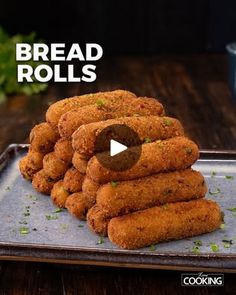 bread rolls stacked on top of each other on a baking sheet with the words bread rolls