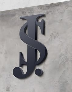 a metal sign that is on the side of a wall with a dollar symbol in front of it