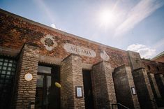 an old brick building with the name aquatura on it