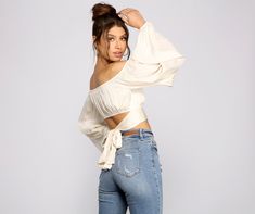 Give off those sweet and flirty vibes in this adorable satin crop top. It features a sweetheart neckline that can be worn off-the-shoulder. long loose bishop sleeves. a tie-back detail. and a cropped. form-hugging fit. Complete your gorgeous look with mom jeans and new heels.Fit & Features Sweetheart neckline Long bishop sleeves Tie-back accent Cropped. form-fitting style Satin fabric Runs true to size Trendy Off-shoulder Crop Top For Brunch, Chic Cropped Off-shoulder Top For Day Out, Chic Off-shoulder Crop Top For Brunch, Sheer Sleeves Top, New Heels, Light Blue Top, Satin Crop Top, Your Gorgeous, Front Tie Top