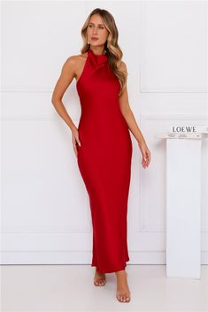 Length from shoulder to hem of size S: 135cm. Chest: 38cm, Waist: 36cm, across front only of size S. Maxi dress. Semi-lined. Model is a standard XS and is wearing size XS. True to size. Non-stretch. Satin. Open back with ties. Subtle cowl neckline. Halter tie. Zipper with hook eye closure. Cold hand wash. Polyester. Gorgeous, sophisticated and your new fave event dress. The Enchanted Daybreak Halter Satin Maxi Dress features an open back with a tie design, a halterneck and a subtle cowl neckline Maxi Dress Red, Event Dress, Tie Design, Satin Maxi, Cowl Neckline, Satin Maxi Dress, Stretch Satin, Hook Eye, Event Dresses