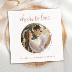 a card with the words cheers to love and a photo of a couple on it