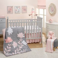 This enchanting baby crib bedding set includes one quilt, one breathable 100% cotton fitted crib sheet, and one decorative crib skirt. The stunning quilt front is 100% cotton sateen on a mink gray ground with beautiful flowers and leaves in petal pink, blush, soft rose and white. The back of the quilt is a cotton twill blend on a petal pink ground with outlined flowers. The breathable 100% cotton fitted crib sheet is on a soft white ground with elegant gray leaves, soft petal pink flowers and sweet open winged birds. There is elastic all the way around ensuring a safe and secure fit on a standard sized crib mattress measuring 28” X 52”. The crib skirt adds the finishing touch of elegance transforming the crib into the centerpiece fit for a fairytale. It is on a petal pink ground with delic Pink Elephant Nursery, Girl Nursery Crib, Girl Nursery Themes, Girl Nursery Bedding, Baby Crib Bedding Sets, Crib Toddler Bed, Girl Cribs