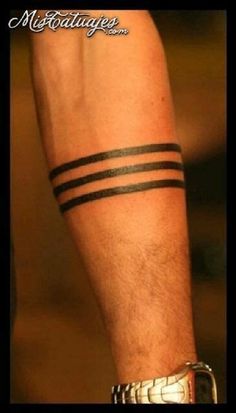 a man's arm with two black stripes on it