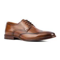 The Orton dress Oxford shoes were designed with the formal gentleman in mind. With a classic wingtip design and lace-up styling, these shoes will put the finishing touch on any outfit. Made with premium leather and carefully crafted details, you can be sure you’re making a statement without compromising on quality or performance. Classic Wingtip Lace-up Shoes For Business, Classic Semi-formal Lace-up Shoes With Goodyear Welt, Classic Wingtip Derby Shoes For Business, Classic Wingtip Derby For Business, Classic Wingtip Derby For Semi-formal Occasions, Classic Semi-formal Derby With Wingtip, Classic Semi-formal Wingtip Derby, Classic Wingtip Dress Shoes With Goodyear Welt, Formal Moc Toe Dress Shoes With Brogue Detailing