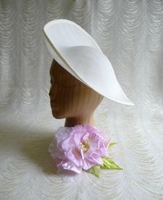 "One large fascinator / hat base made of buckram fabric in ivory cream in an oblong teardrop shape that measures approximately 12\" (30.5 cm) at its widest point and approximately 12.5\" (31.75 cm) at its longest point. Nice curvature to fit against your head that accommodates lots of different hairstyles with a flirty upturned brim. The fabric is feather light but has a great sturdy weave that provides excellent support for your millinery creations. I particularly like that the finish is not sh Buckram Fabric, Hat Form, Cream Hat, Royal Outfit, Millinery Supplies, Hat Base, Hat Fascinator, Fascinator Hat, Diy Hat