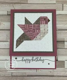 a happy birthday card with an origami bird