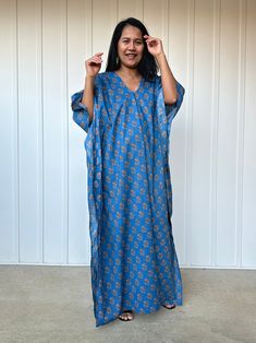 Flow in total comfort with our light cotton print kaftan. This kaftan is perfect for the beach, pool, resort and laid-back time at home. Crafted from quality soft and light 100% cotton, it offers an airy fit that's ideal for lounging and out and about. Its relaxed design and easy slip-on style make it your go-to choice for outdoor happenings and relaxed nights at home. Blue Summer Sleepwear For Home, Blue Casual Kaftan For Poolside, Casual Blue Kaftan For Poolside, Blue Relaxed Fit Kaftan For Beachwear, Blue Summer Sleepwear With Kimono Sleeves, Blue Bohemian Sleepwear For Vacation, Blue Relaxed Fit Beachwear Kaftan, Blue Sleepwear With Kimono Sleeves For Summer, Bohemian Blue Sleepwear For Vacation