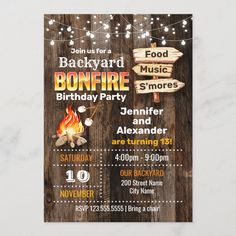 a bonfire birthday party with wood and string lights