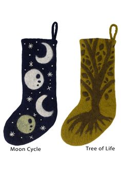 two christmas stockings with trees and moon designs