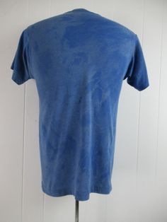 "Vintage 1980s t shirt. Made of blue tie dye style poly/cotton with yellow and white graphics: Canadian Club fun in the sun. Made by Screen Stars. Size medium. Actual measurements are: 37\" around the chest 37\" around the waist 17\" shoulder seam to shoulder seam 27\" overall length In good condition with a couple 1\" spots(photos)." Canadian Club, Beauty Forever, 1970s Dresses, Club T Shirt, Hawaiian Dress, Vintage Hawaiian, Blue Tie, Blue Tie Dye, Blue Ties