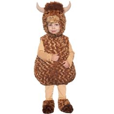 a little boy dressed in a costume that looks like a cow with horns on it's head