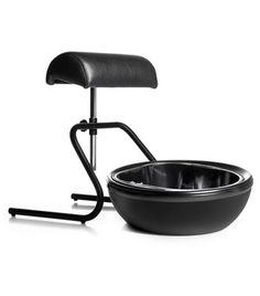 a black chair and bowl on a white background