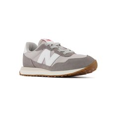 Complete her wardrobe with these New Balance 237 girls' shoes. Click this FOOTWEAR GUIDE to find the perfect fit and more! Complete her wardrobe with these New Balance 237 girls' shoes. Click this FOOTWEAR GUIDE to find the perfect fit and more! TECHNOLOGIES & FEATURES Gator inspired foxing and mudguard Oversized N logo Breathable design Foam footbed for all day comfort Bungee lace-up closure for easy on and offDETAILS Unbacked synthetic, unbacked nylon upper Polyester / mesh lining EVA midsole New Balance Spring Running Shoes, New Balance Spring Sneakers With Round Toe, New Balance Sneakers For Spring, Spring New Balance Sneakers With Round Toe, Casual New Balance Running Shoes With Round Toe, New Balance 237, N Logo, Shoe Size Chart, Men Shoes Size