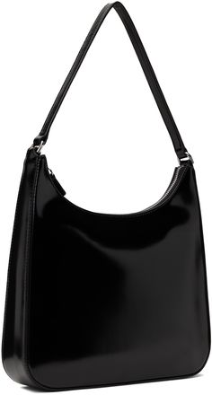 Polished leather shoulder bag in black. · Fixed shoulder strap · Logo embossed at back face · Zip closure · Patch and zip pocket at interior · Suede lining · H10.5 x W11 x D2.5 Supplier color: Black Staud Leather Evening Shoulder Bag, Staud Leather Shoulder Bag For Evening, Sleek Hobo Shoulder Bag For Formal Occasions, Staud Top Handle Evening Shoulder Bag, Classic Staud Bags, Staud Double Handle Evening Bag, Sleek Black Baguette Bag, Staud Satchel Shoulder Bag For Evening, Elegant Staud Crossbody Shoulder Bag