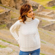 Working with a baby alpaca blend in solid alabaster Peruvian artisan Wilber Calapuja creates this warm pullover. He knits the turtle neck pullover to feature cable and openwork patterns. Baby alpaca refers to the fine fleece from the season's first shearing. White Knitted Alpaca Sweater, Cream Knitted Alpaca Sweater, Cream Long Sleeve Alpaca Sweater, Cozy Cream Alpaca Sweater, Alpaca Baby, Alpaca Sweater, Beautiful Sweater, Autumn Fashion Casual, Warm Sweaters