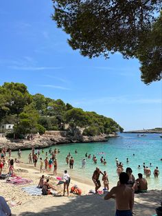 many people are on the beach and in the water at this point, there is no image here