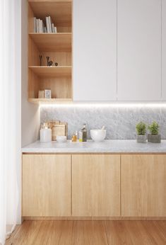 a kitchen with wooden cabinets and marble counter tops, along with white wall - mounted shelving