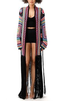 Long sleeve with belt. Fringe, cut to your own length. Acrylic Black Bohemian Long Sleeve Cardigan, Chic Long Sleeve Cardigan For Festival, Black Open Front Sweater For Spring, Fitted Long Sleeve Cardigan For Festival, Long Black Summer Cardigan, Black Long Cardigan For Summer, Fitted Black Bohemian Cardigan, Chic Black Festival Outerwear, Trendy Black Outerwear For Festival