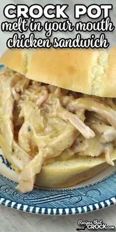 a chicken sandwich on a plate with the words crock pot melt in your mouth, chicken sandwich