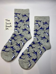 Hi, welcome to The Sock Shack! This listing is for our amazing Shark print socks. The socks fit anyone with UK shoe size 4-6.  Message us if you have any questions and take a look at our shop for more great socks! Shark Socks Crochet Pattern, Shark Socks Knitting Pattern, Funny Blue Socks For Gift, Shark. Socks, Casual Cotton T-shirt With Shark Design, Mens Novelty Socks, Sock Animals, Novelty Socks, Casual Socks