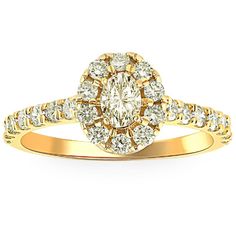 a yellow gold engagement ring with an oval cut diamond surrounded by small round brilliant diamonds