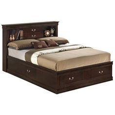 a bed with two drawers underneath it and a night stand in the middle of the bed