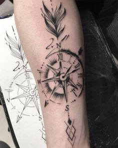 a black and white photo of a clock with feathers on it's arm, done by person