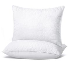 the white pillows and pillowcases are both made from downy or polyestere