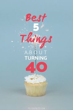 a cupcake with white frosting and sparklers in the middle that says best 5 things about turning 40