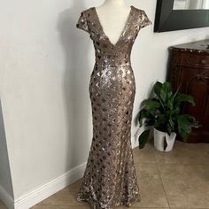 Size Small Champagne Maxi Length Cocktail Dress, Champagne Color Maxi Dress For Cocktail, Champagne Floor-length Cocktail Dress, Champagne Sequin Dress For Formal Occasions, Formal Champagne Dress With Sequins, Champagne Fitted Maxi Dress For Evening, Champagne Sequin Dress For Holiday Formal Events, Champagne Sequin Dress For Formal Holiday, Champagne Maxi Dress For Evening Party Season